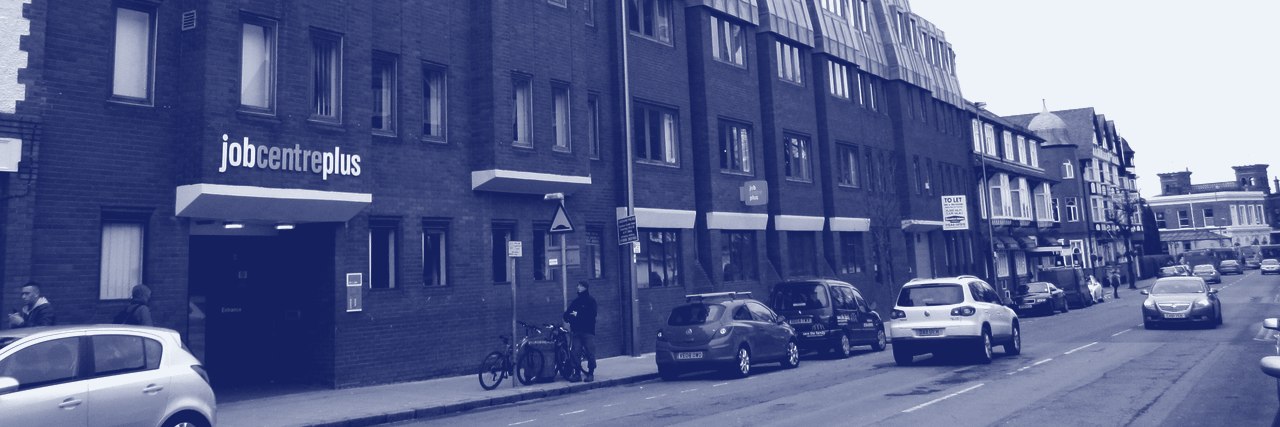 The jobcentreplus sign above the entrance to a Jobcentre Plus office on a Chester street.